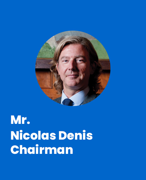 Nicolas Denis Chairman Blue bkgrnd